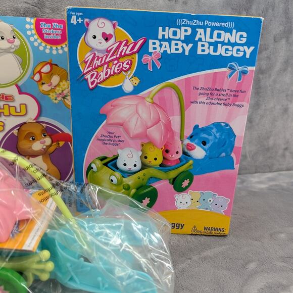 Zhu Zhu lot - babies hop along baby buggy NIB, 1 hampster & a book with stickers - Picture 2 of 13